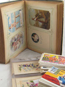 Twelve embroidered postcards over