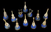 TWELVE GILDED SILVER AND LAPIS