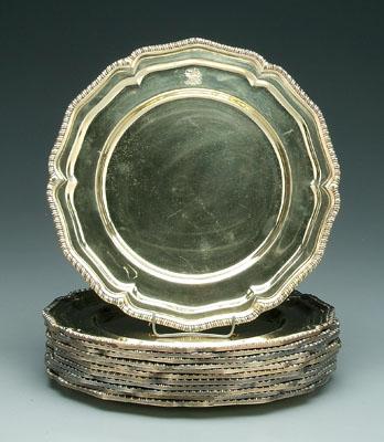 Twelve gilt silver plate plates:
