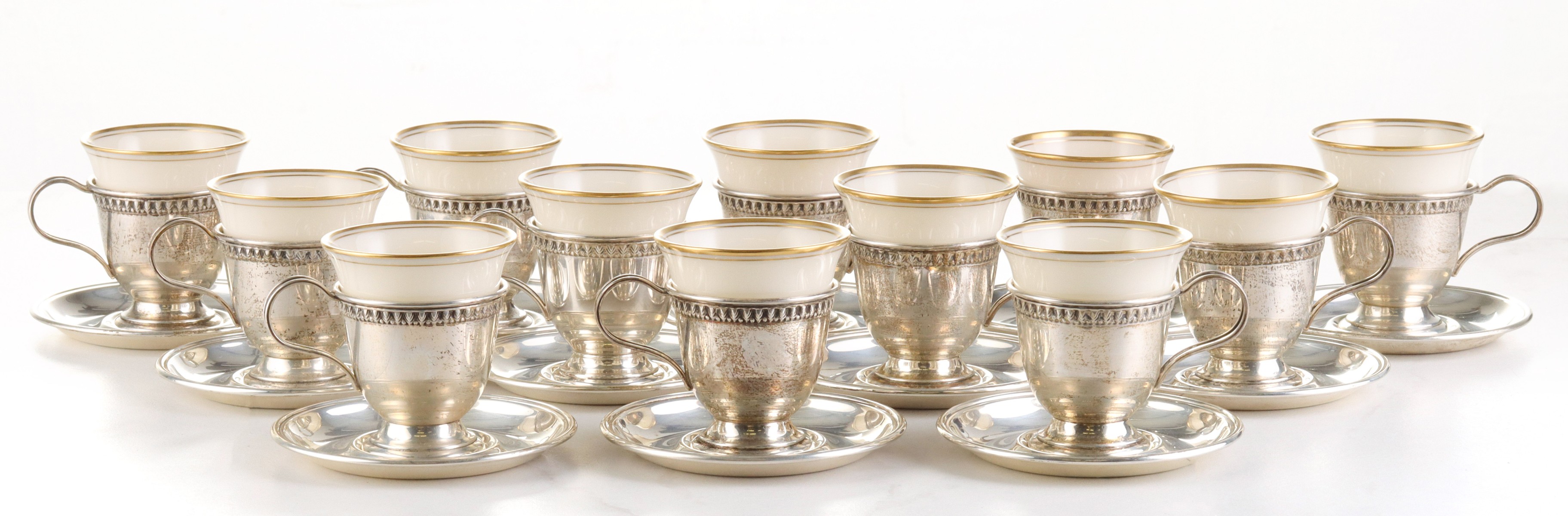 TWELVE LENOX PORCELAIN DEMITASSE IN