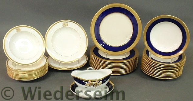Twelve Lenox service plates with