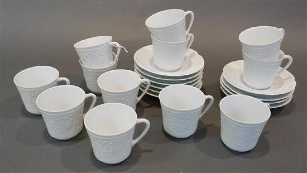 TWELVE LIMOGES WHITE PORCELAIN CUPS