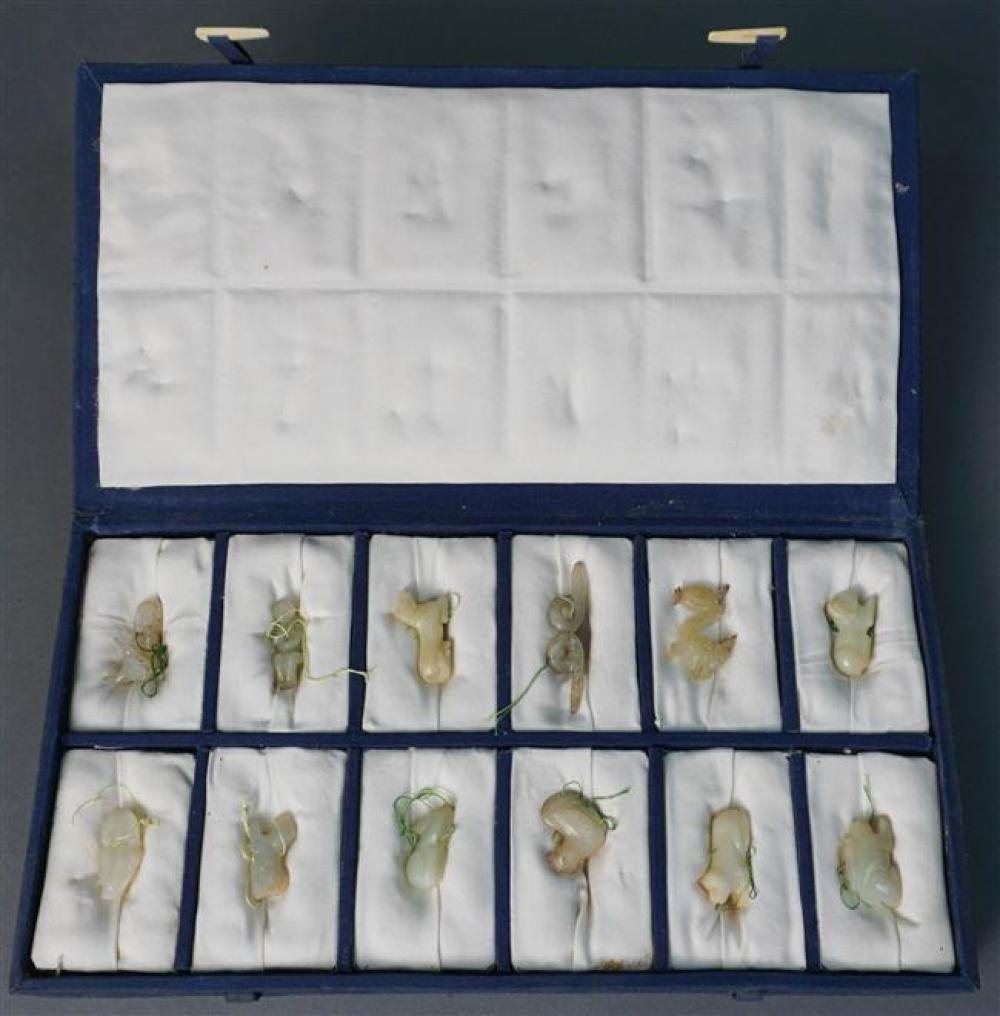 TWELVE MINIATURE CARVED JADE AND