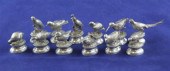 Twelve modern silver novelty m