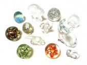 Twelve paperweights: two eleph