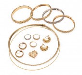 TWELVE PIECES OF 14 KT. YELLOW