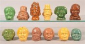 TWELVE POTTERY FIGURAL BUST ST