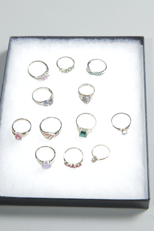 TWELVE RINGS. All marked 14K.
