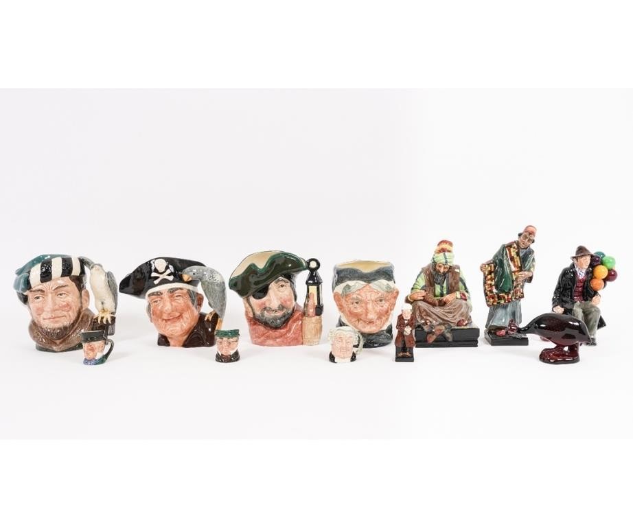 Twelve Royal Doulton character mugs