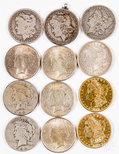 TWELVE SILVER DOLLARSTwelve