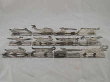Twelve silver plated knife rest