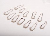 Twelve silver wine labels, thr
