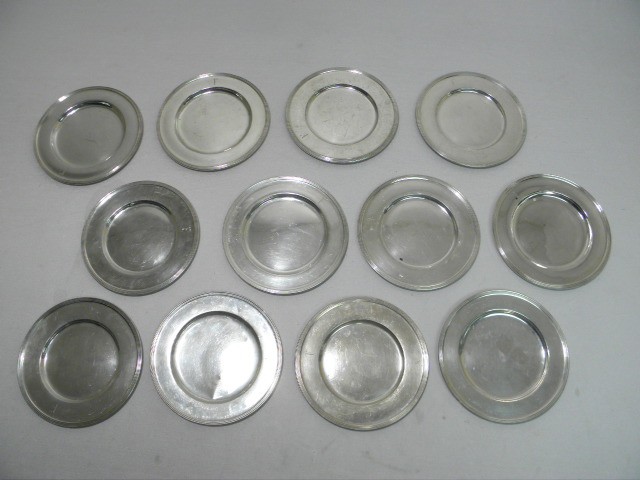 Twelve small sterling silver