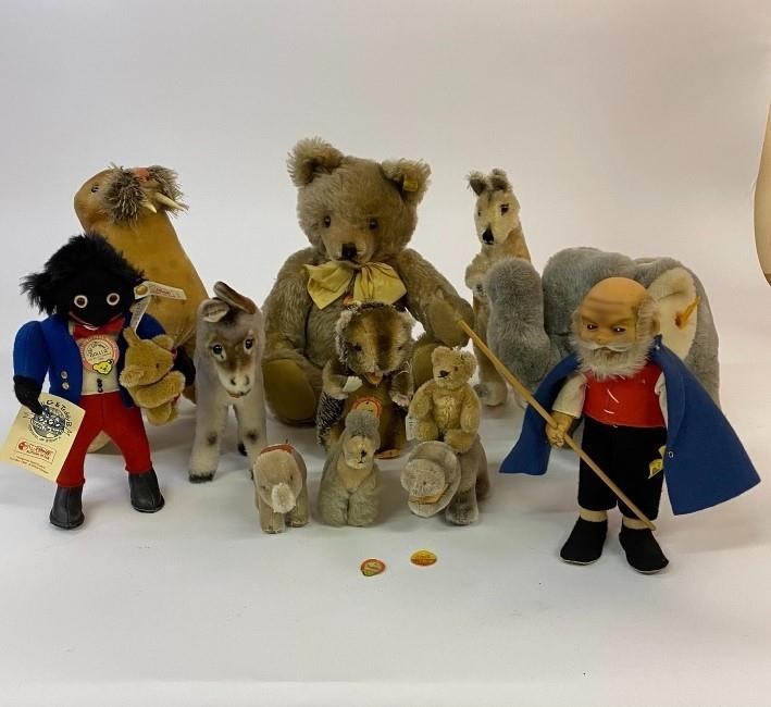 Twelve Steiff figures including a