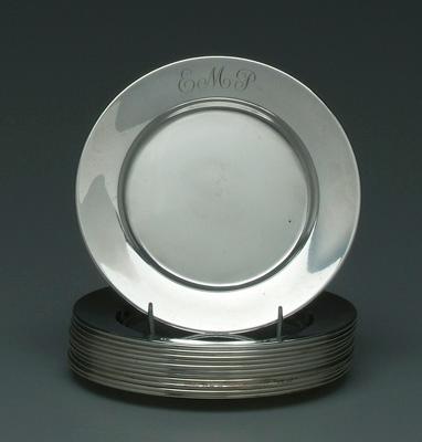 Twelve sterling bread plates: