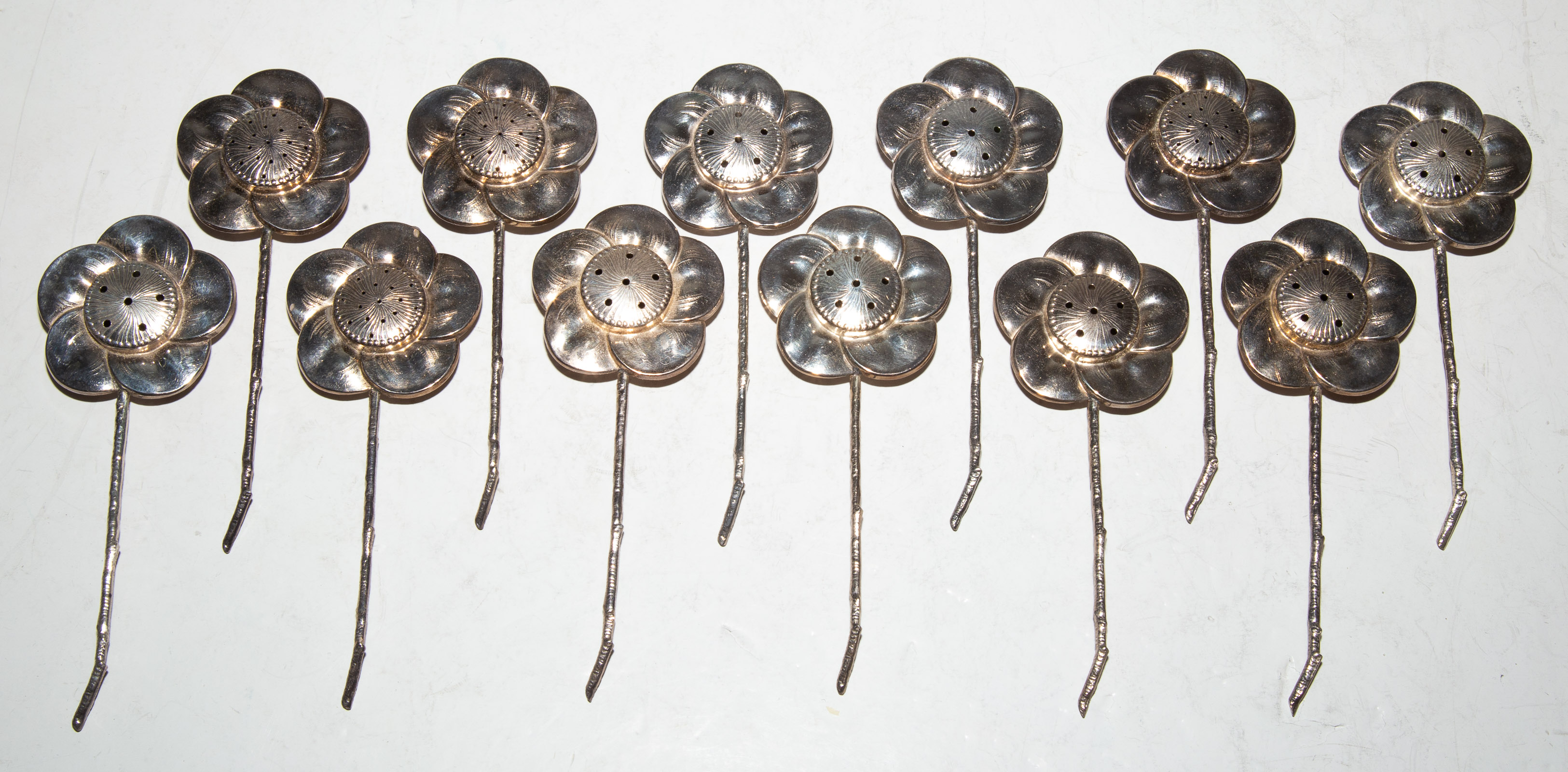 TWELVE STERLING FLOWER-FORM SALT