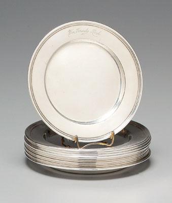 Twelve sterling plates: reeded