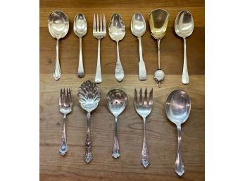 Twelve sterling serving spoons