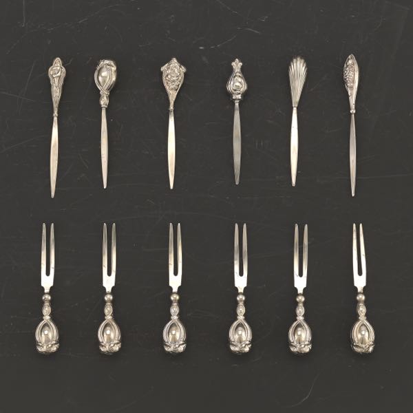 TWELVE STERLING SILVER CANAPé