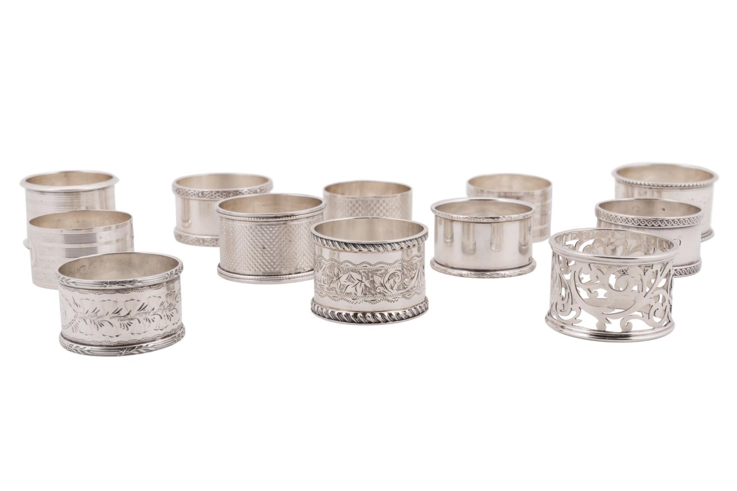 TWELVE STERLING SILVER NAPKIN RINGS
