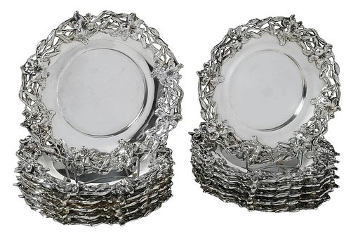 TWELVE STERLING SMALL PLATES WITH