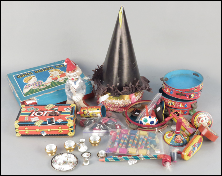 TWELVE TIN TOY NOISE MAKERS.