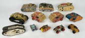 TWELVE TIN WIND-UP TANKS, MOST