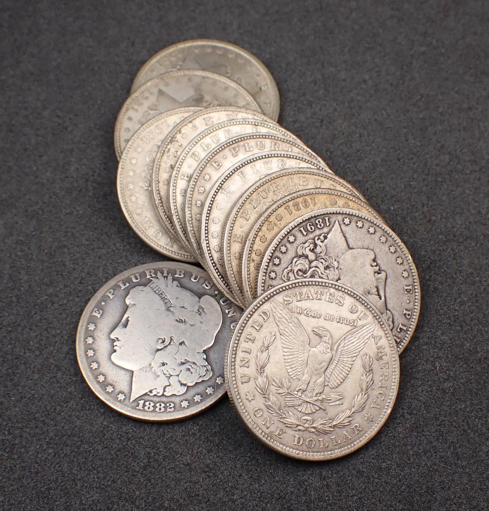 TWELVE U.S. SILVER MORGAN