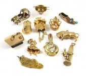 TWELVE YELLOW GOLD CHARMS incl