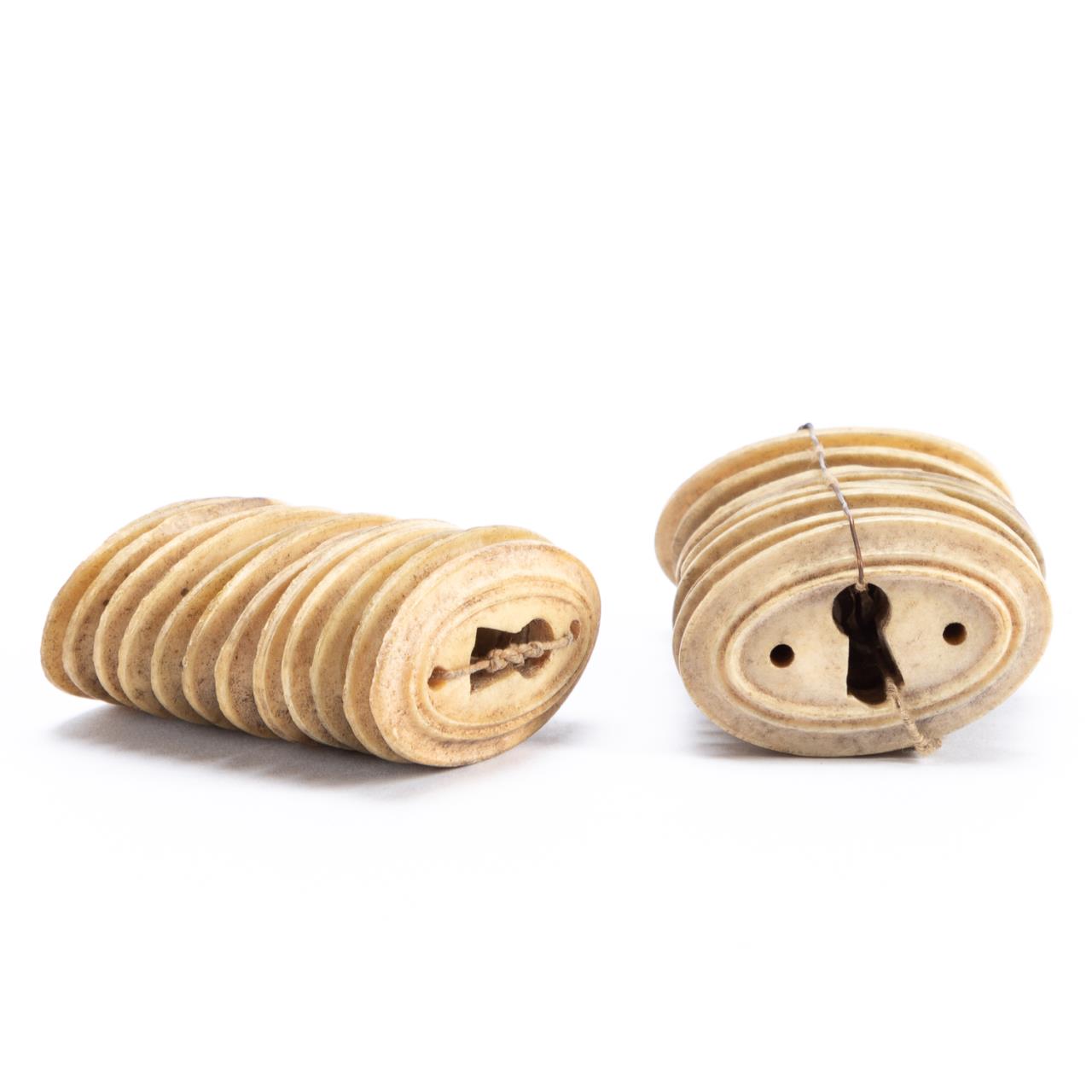 TWENTY-FOUR CARVED BONE