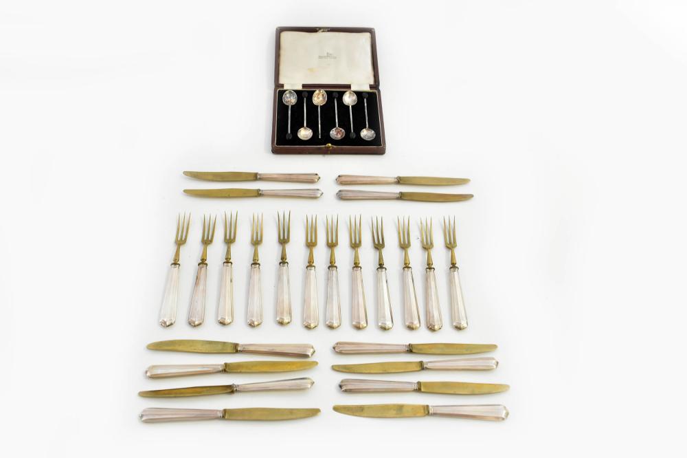 TWENTY-FOUR SILVER HANDLED KNIVES