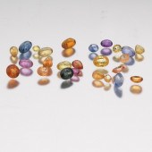 TWENTY-FOUR UNMOUNTED 10.07 CT