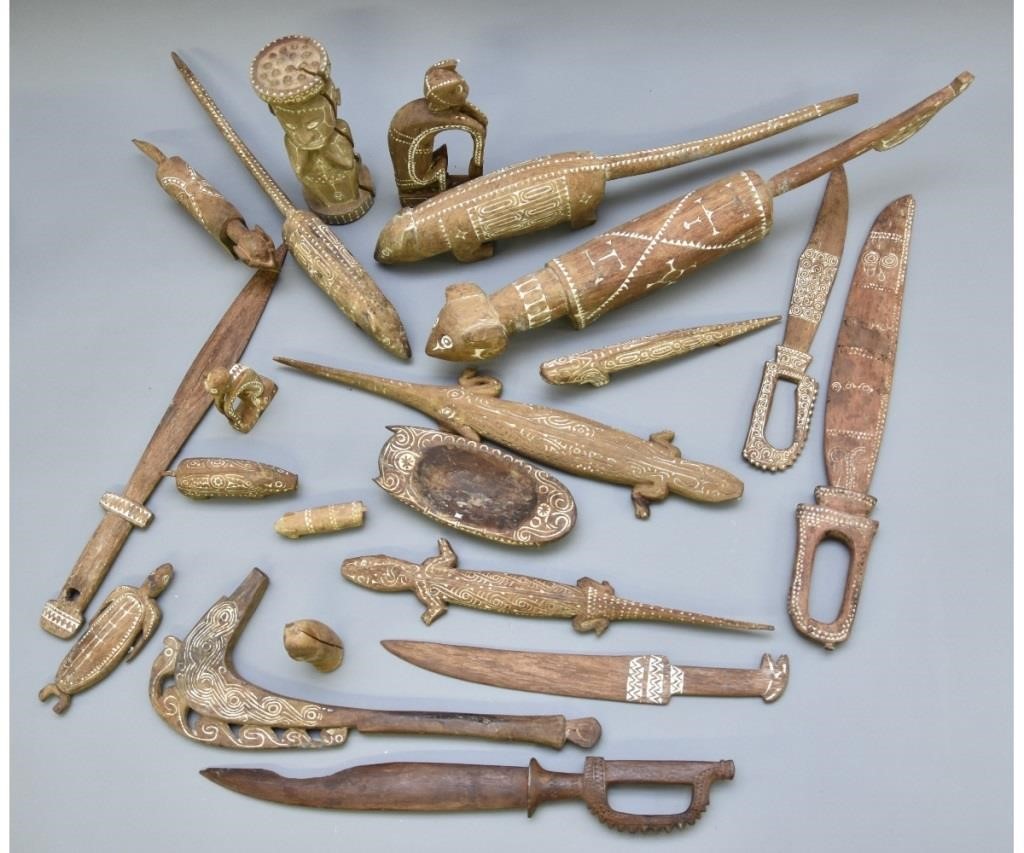 Twenty-one carved Aborigine