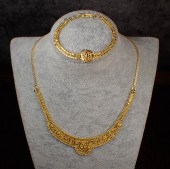 TWENTY-ONE KARAT GOLD BRIDAL N