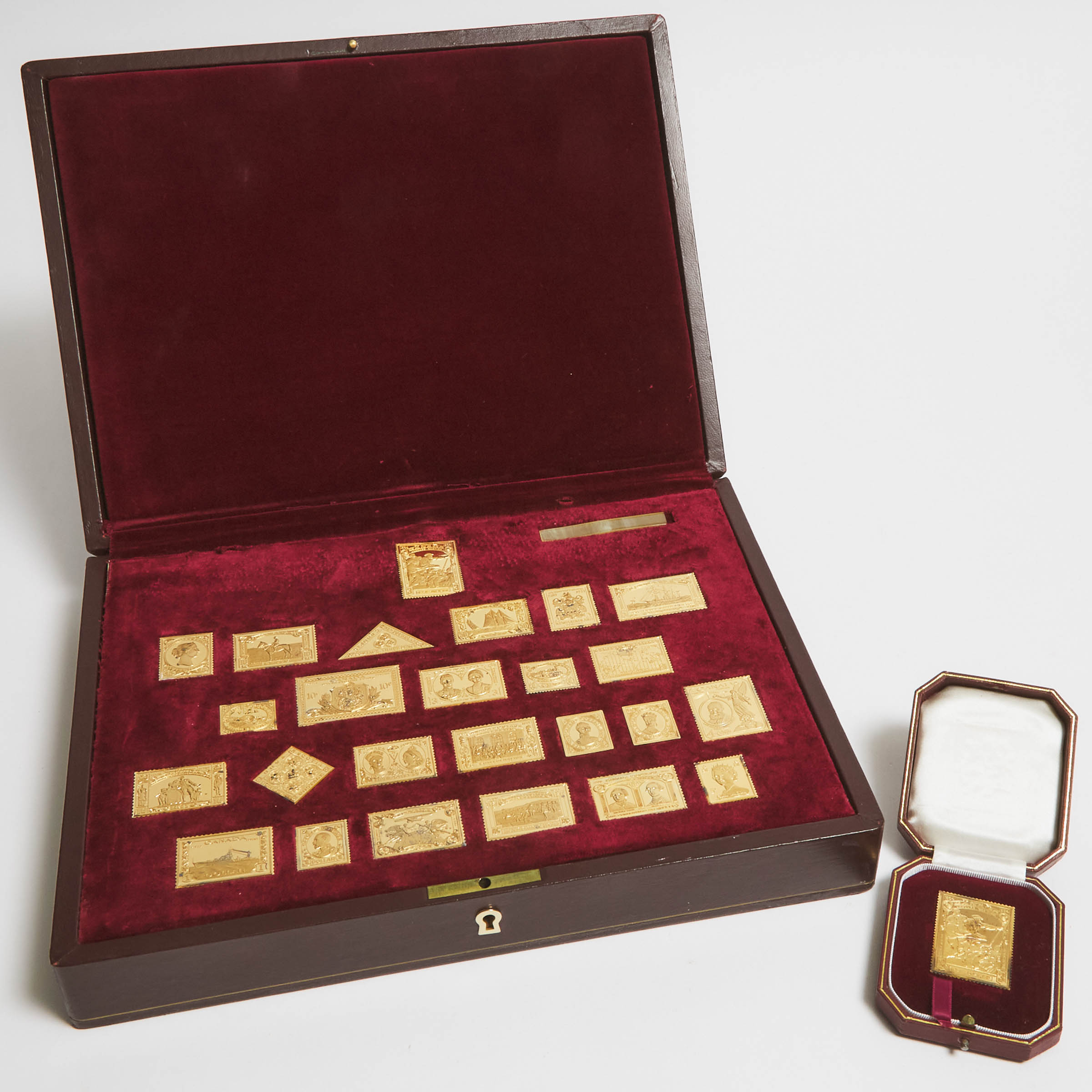 Twenty-Six Silver Gilt Ingot Form