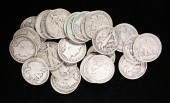 TWENTY-SIX SILVER HALF DOLLARS