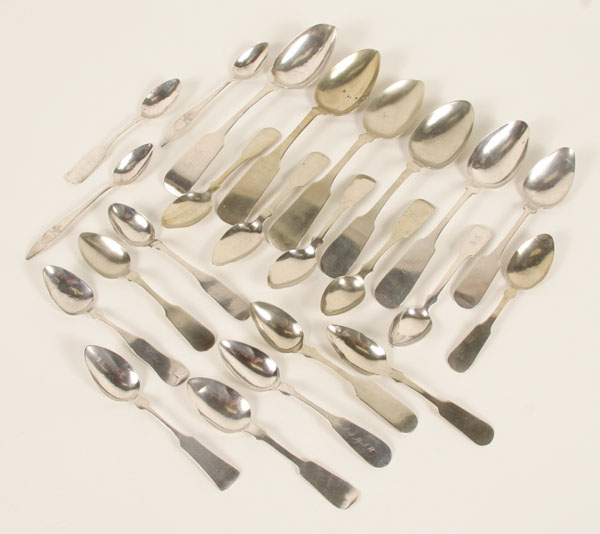 Twenty-three coin silver spoons