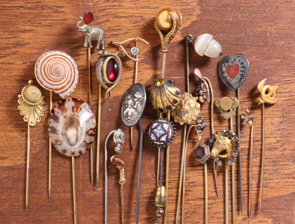 TWENTY-TWO ANTIQUE STICK PINS. 19th