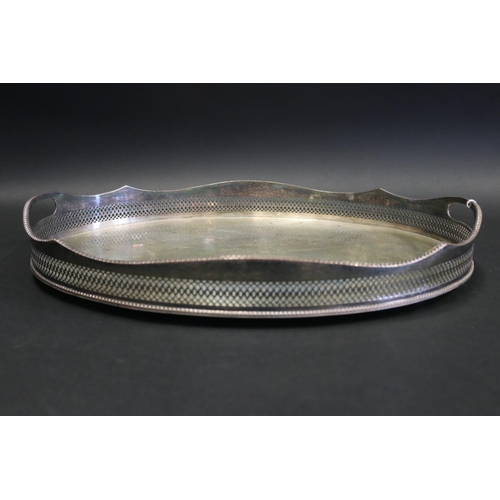 Twin handled pierced rim silver