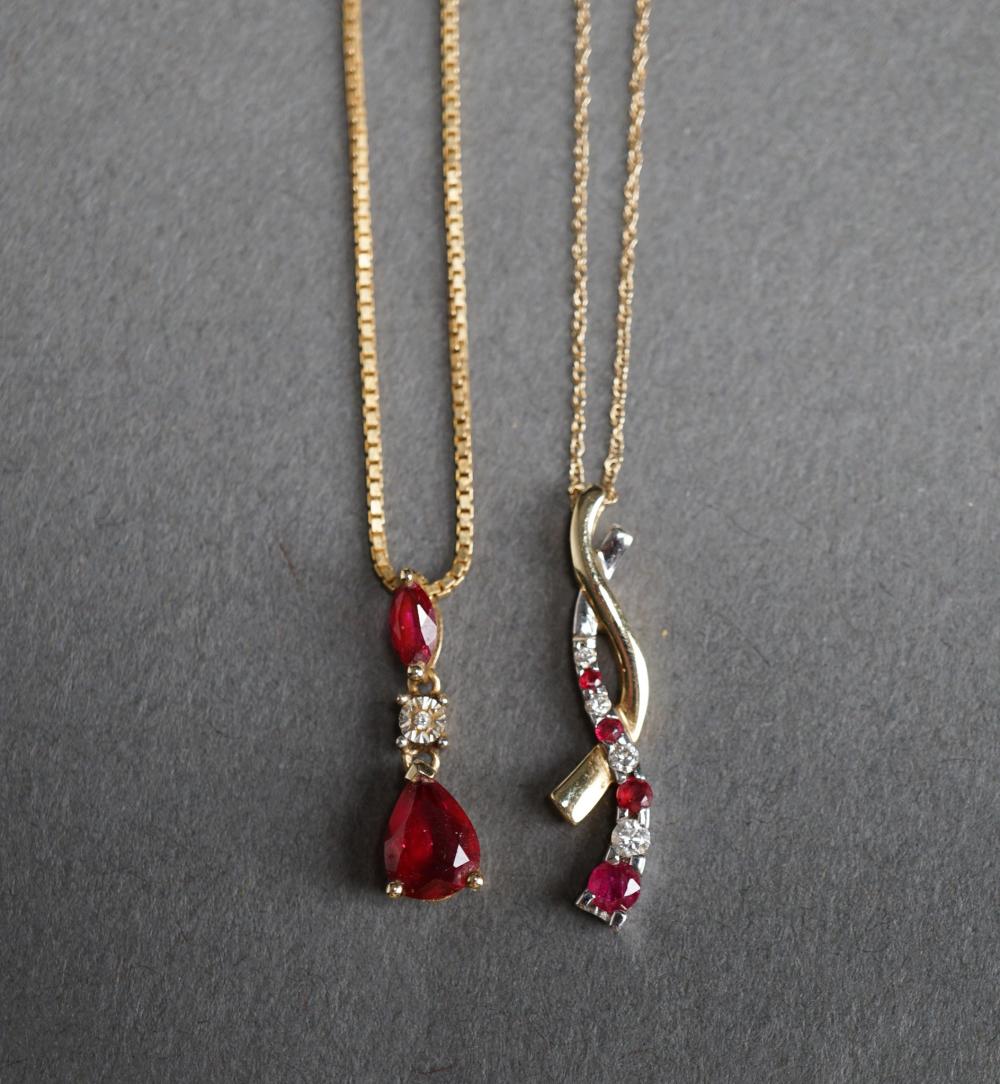 TWO 10-KARAT GOLD PENDANTS, 4.3