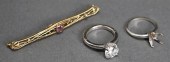 TWO 14-KARAT WHITE-GOLD RINGS