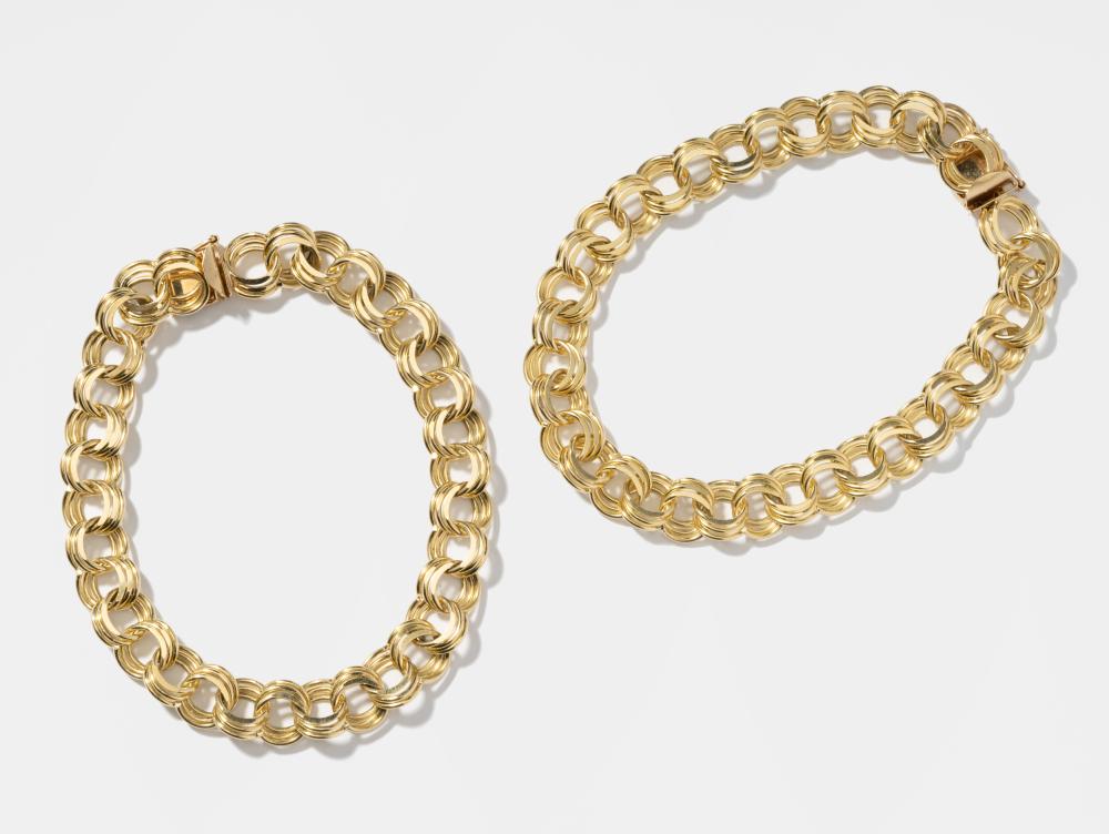 TWO 14 KARAT YELLOW GOLD CIRCULAR