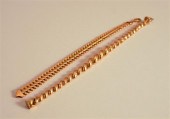 TWO 14 KARAT YELLOW GOLD BRACE