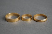 TWO 14-KARAT YELLOW-GOLD WEDDI
