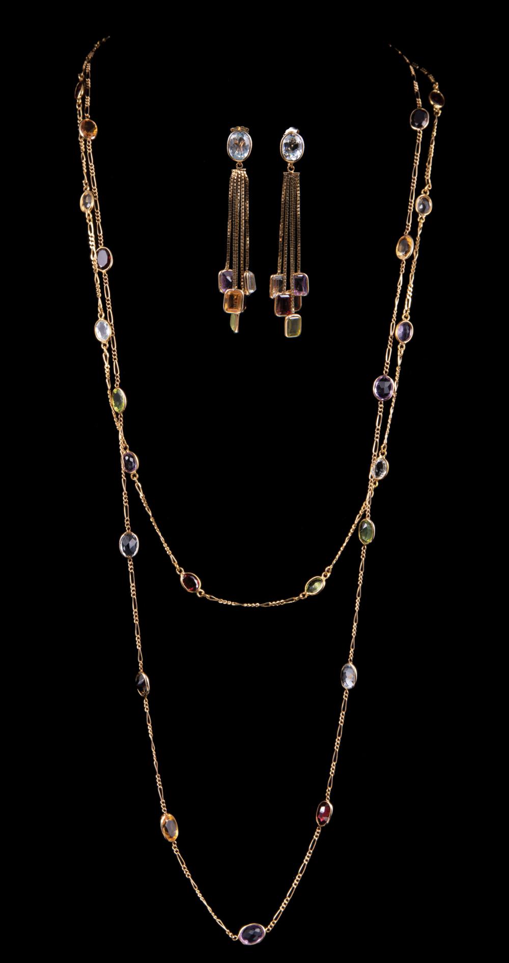 TWO 14 KT. YELLOW GOLD AND GEMSET