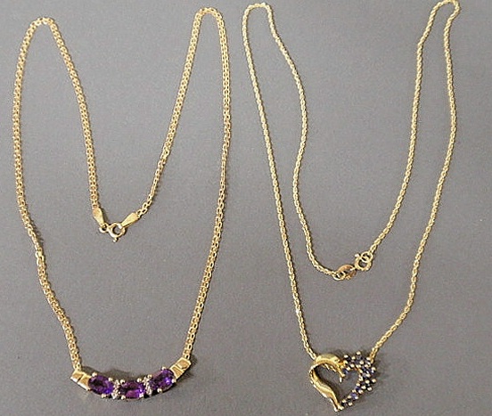 Two 14k gold necklaces- heart