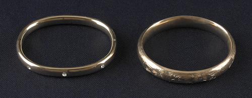 Two 14K yellow gold bangle