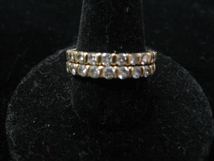 Two 18 karat yellow gold and