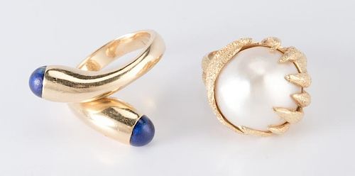 TWO 18K FASHION RINGS1st item: