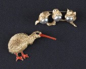 Two 18K yellow gold bird brooc